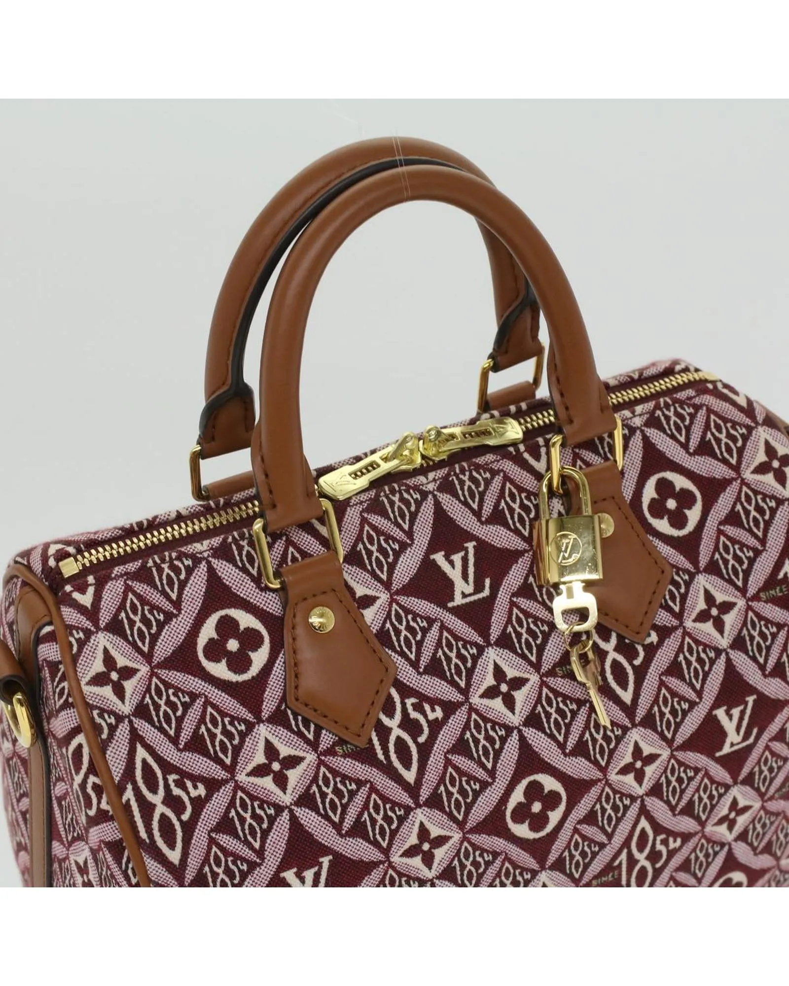 Jaguar Bandouliere 25 Hand Bag in Bordeaux Since 1854 Print